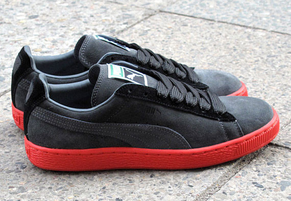 black and red suede pumas