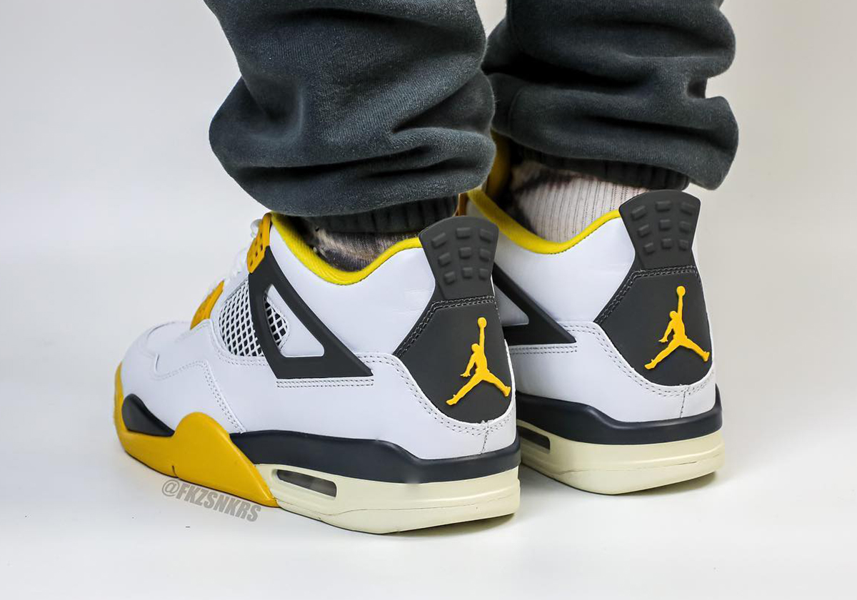 Air Jordan 4 Womens Vivid Sulfur AQ9129-101 | SneakerNews.com