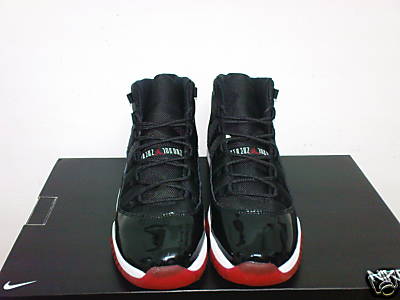 Air Jordan XI (11) - Black - True Red - Countdown Pack