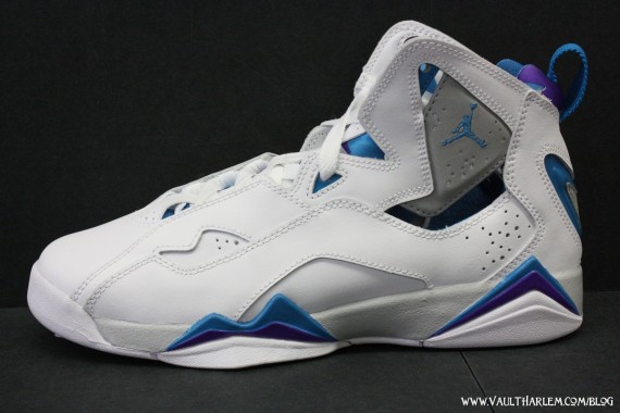 white and turquoise jordans