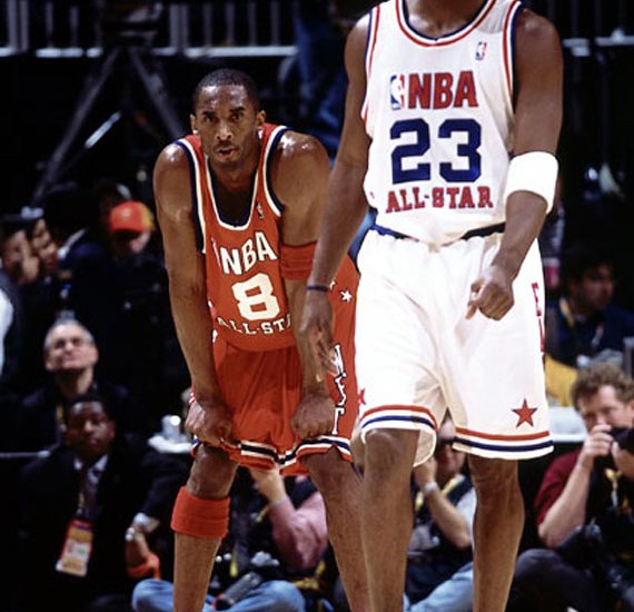 Kobe Bryant wearing number 8 jersey and Air Jordan Retro VIII PE shoes