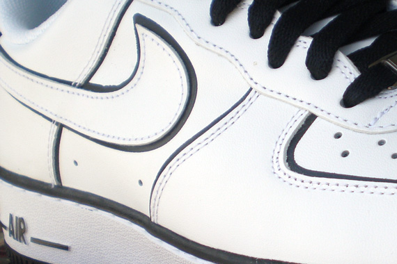 white air force ones with black outline