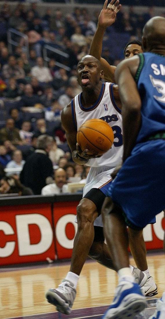 Michael Jordan wearing Cool Grey Nike Air Jordan 11 (XI