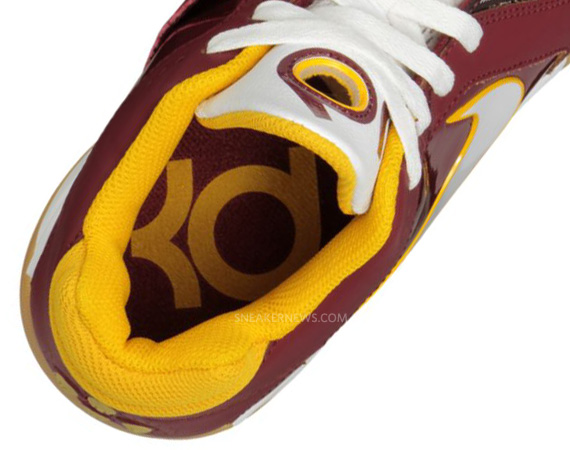 burgundy and gold nikes