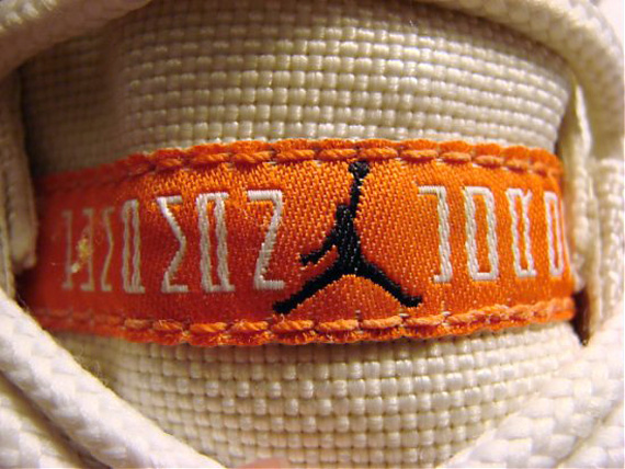 Orange and white jordans 11 sale