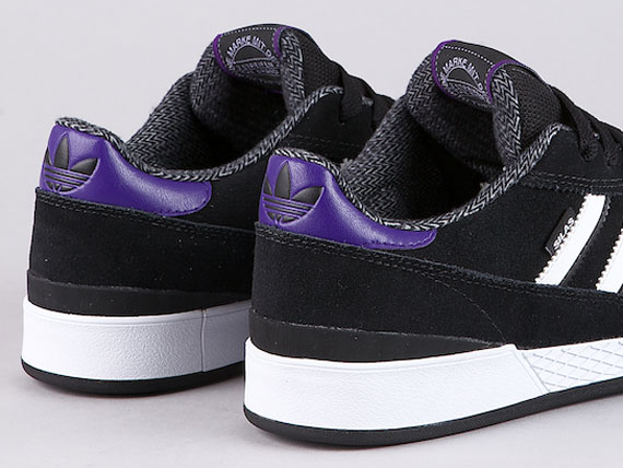 Purple adidas skate on sale shoes