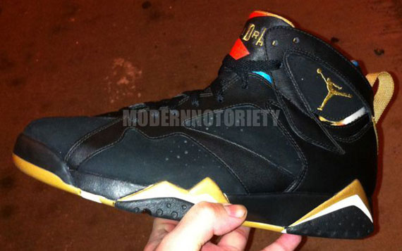 gold and black jordan 7