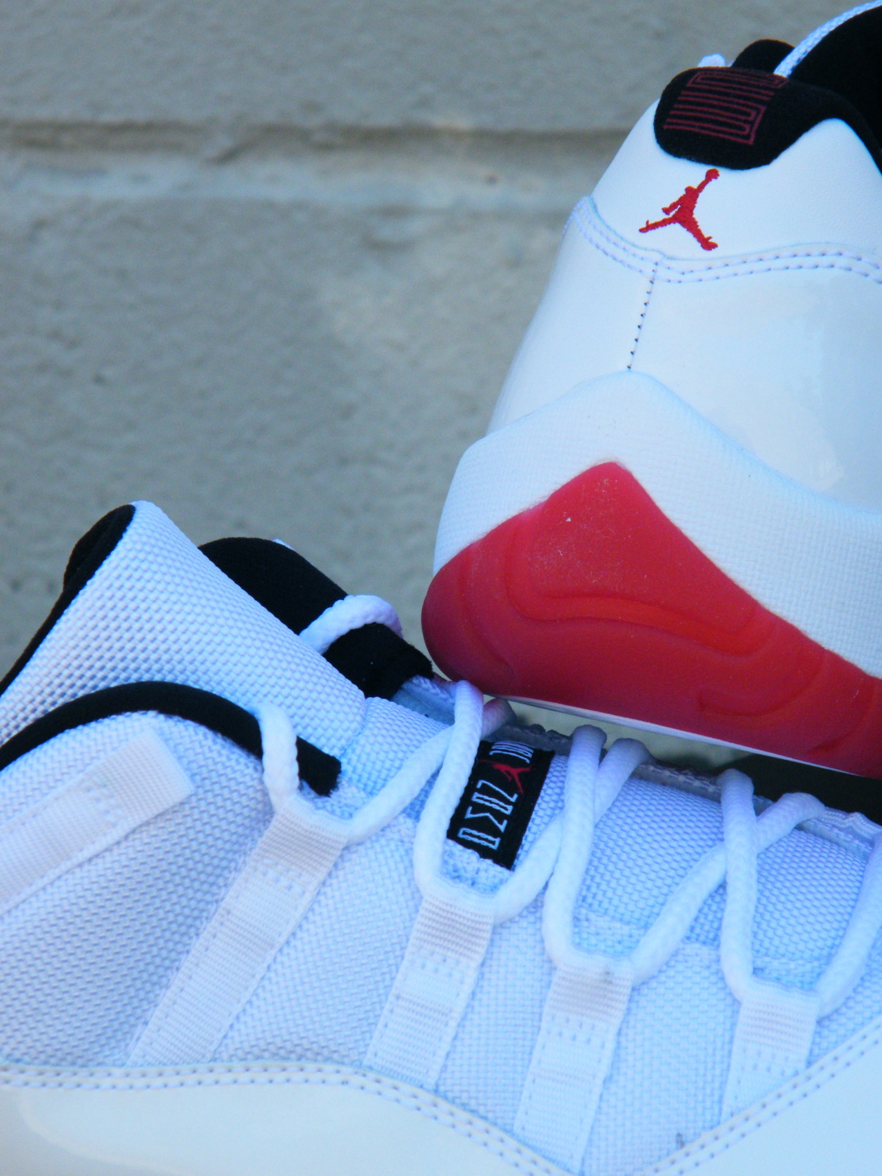 Air Jordan Xi Low White Varsity Red Arriving At Retailers 3