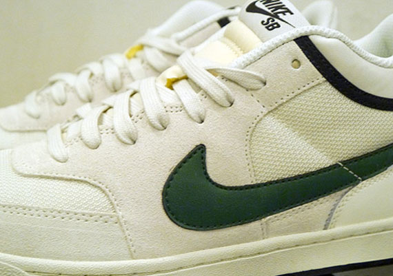 white nikes green swoosh