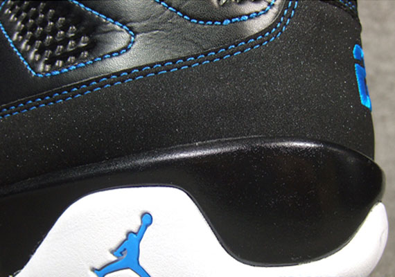 black and blue jordan 9