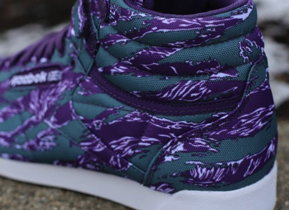 Purple high top reebok best sale