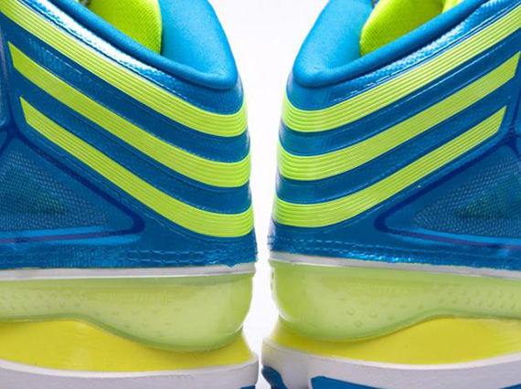 Adidas blue and sales lime green shoes