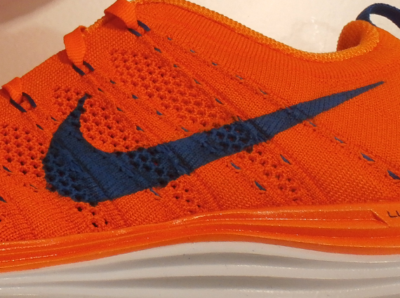 orange and blue nike flyknit