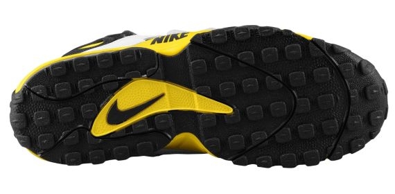 black and yellow turf shoes