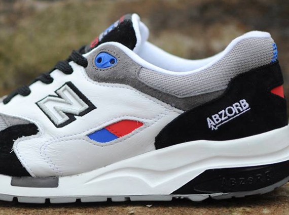 New Balance CM1600 – Black – White – Red – Blue