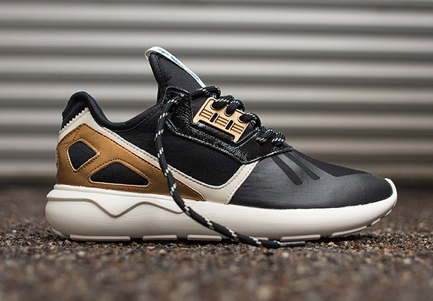 Adidas originals tubular black and gold sale