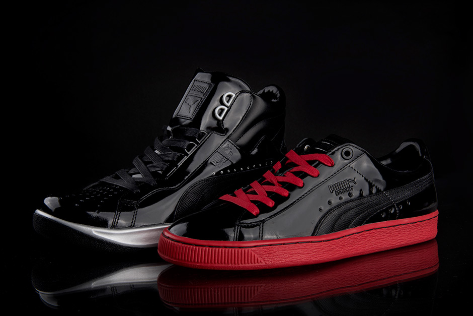 puma black and red sneakers