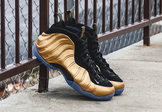 nike foamposite one gold