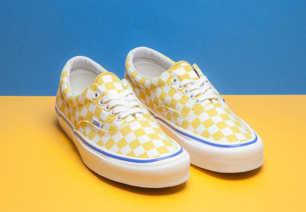 Vans yellow checkerboard hot sale high tops