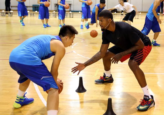 Paul George And The nike air forces black on feet and legs fast Take On Beijing In The Nike Rise Tour