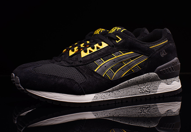 asics black and yellow shoes