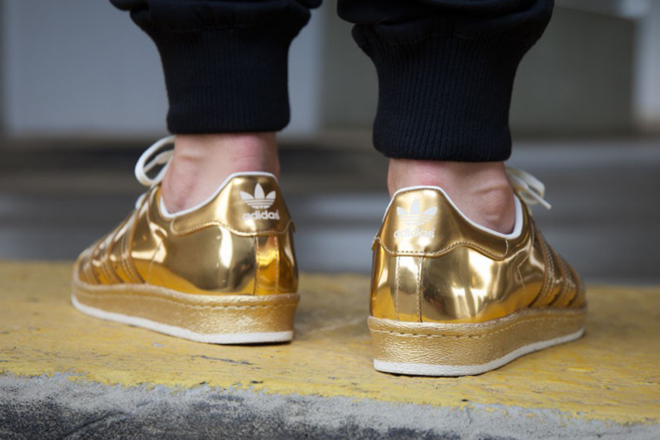 A Golden Take On The Classic adidas Superstar - SneakerNews.com