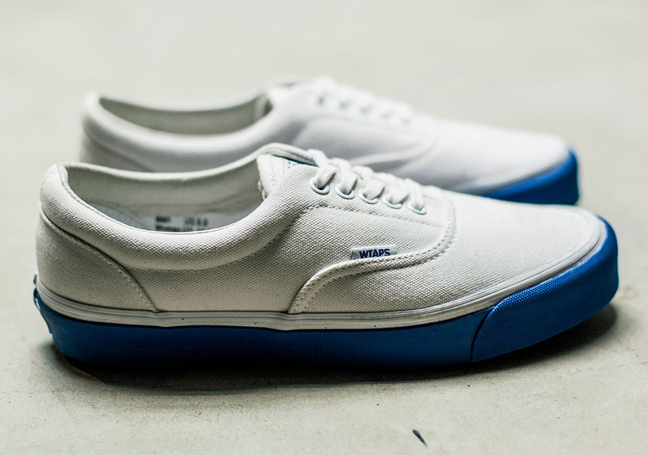 white vans with blue sole