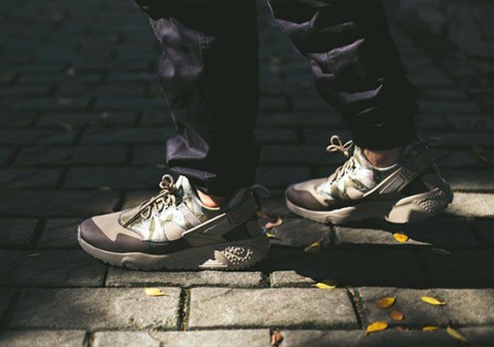 nike air huarache utility camo on foot 1