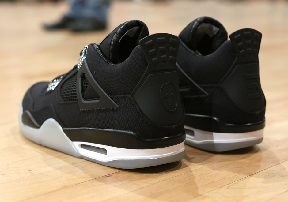 Jordan 4 x eminem best sale x carhartt