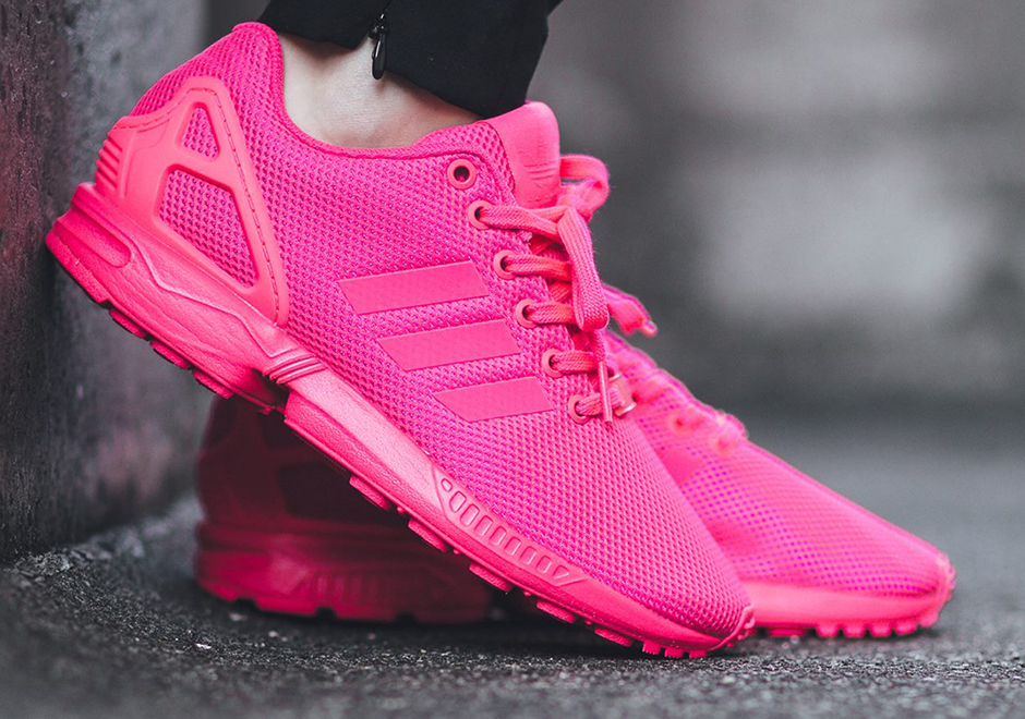 neon pink adidas sneakers