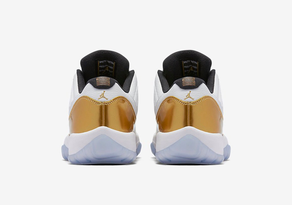 white and gold low top 11s