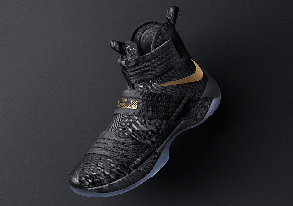 lebron gold and black shoes