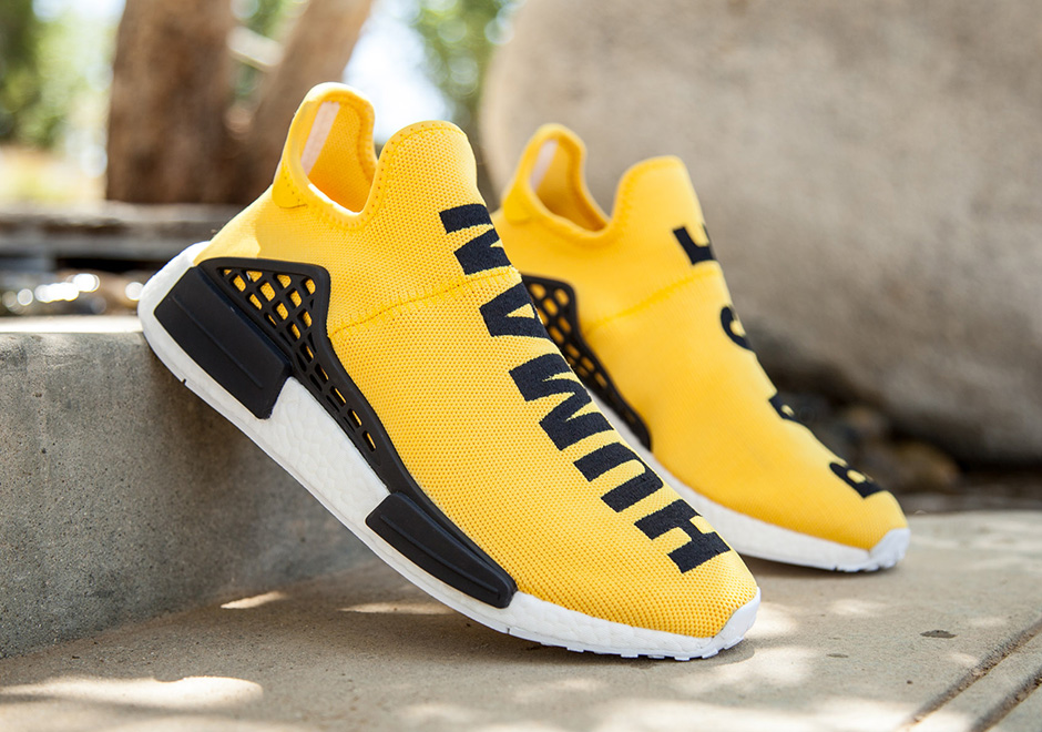 Yellow and black deals human race sneakers