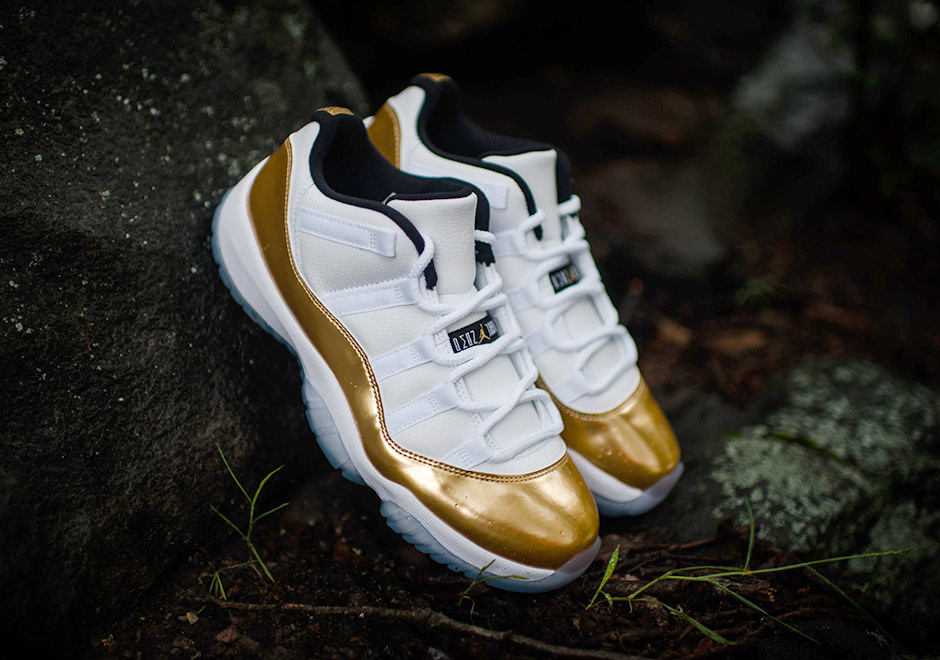 white and gold low top 11s