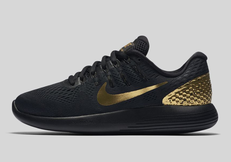 gold and black nike
