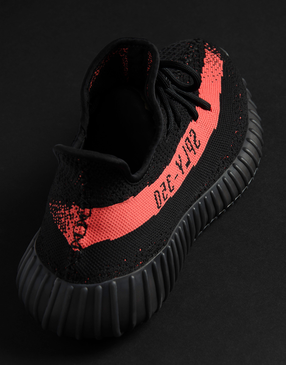 yeezy black with red stripe