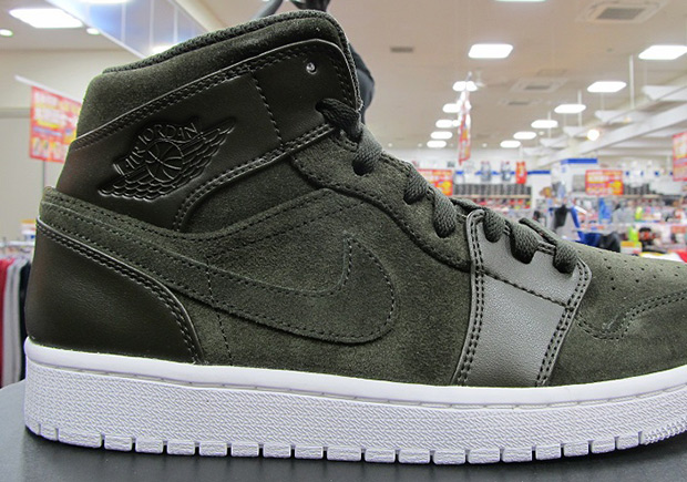 See The New Suede/Leather Air Jordan 1 Mid On Feet