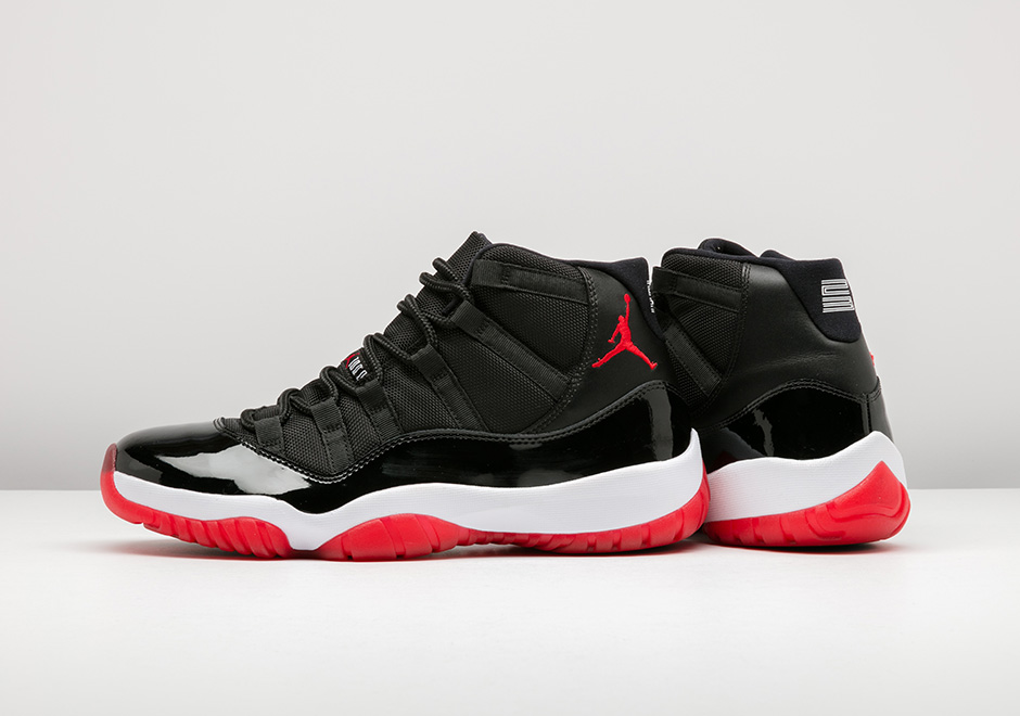 jordan 11 all black red bottom