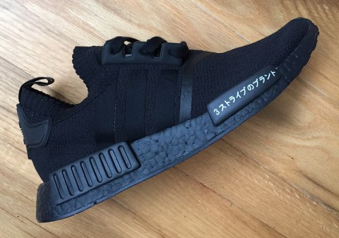 nmd r1 japan triple black