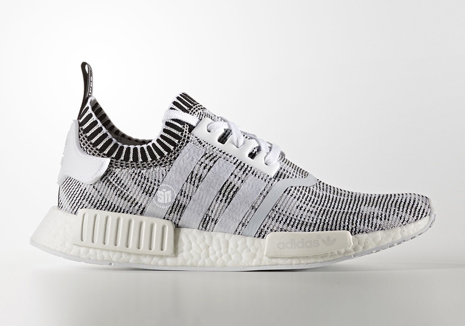 white nmd with black stripes