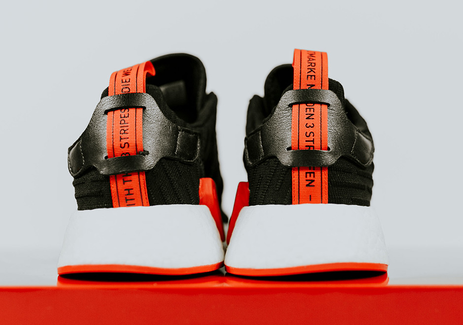 nmd r2 black and red