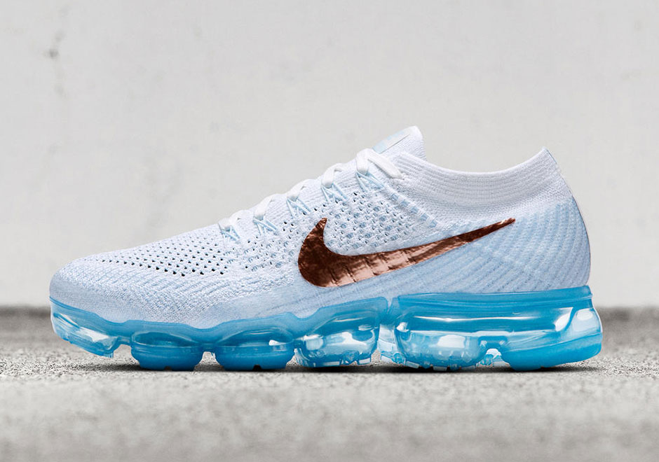 white and light blue vapormax