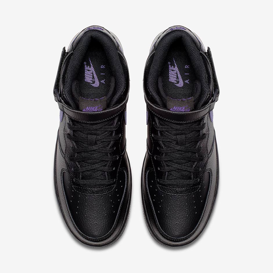 black nike with purple swoosh