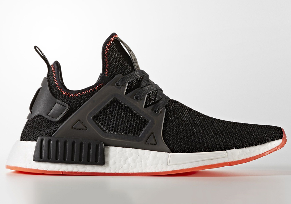 black and orange nmd