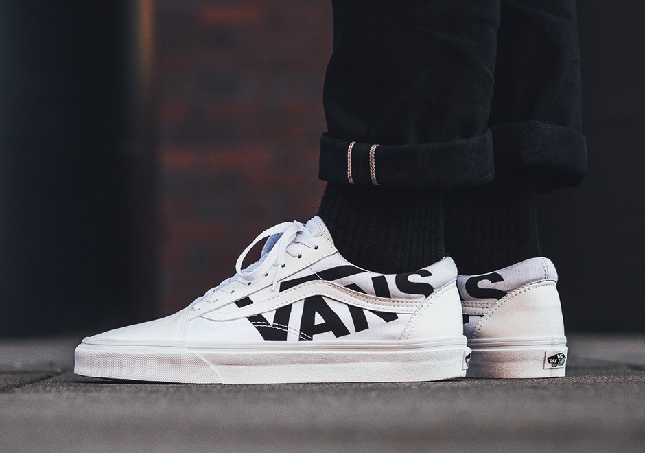 white vans with black letters