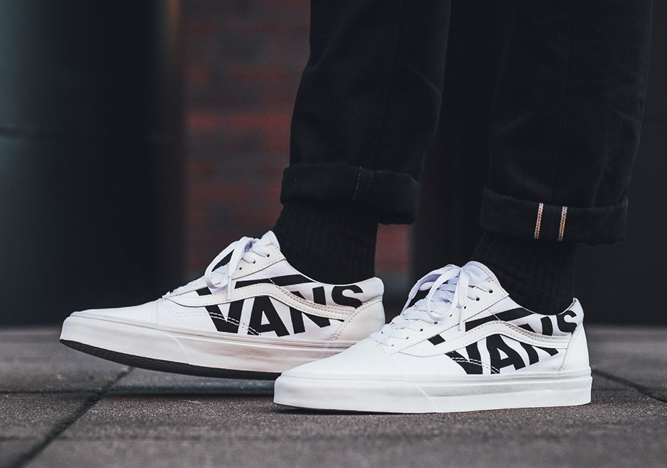 vans black and white with writing