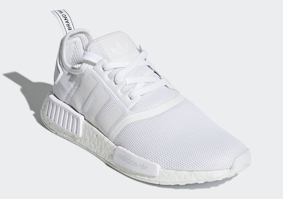 white nmd with black stripes