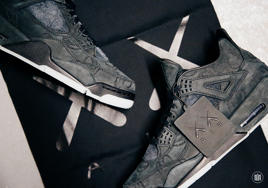 Jordan 4 KAWS Black Release Date | SneakerNews.com
