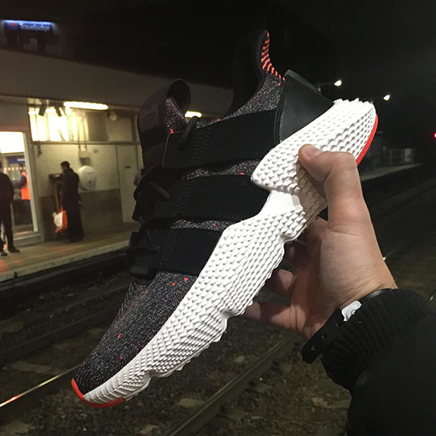 Adidas prophere black solar on sale red