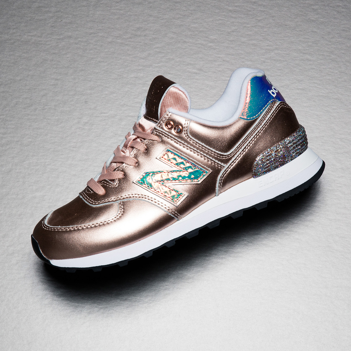 new balance 574 glitter Cinosural International School